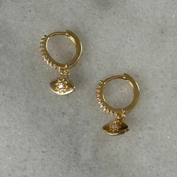 Gold Crystal Pave Evil Eye Star Burst Huggie Hoop Dangle Earrings
Brand New - Picture 6 of 6